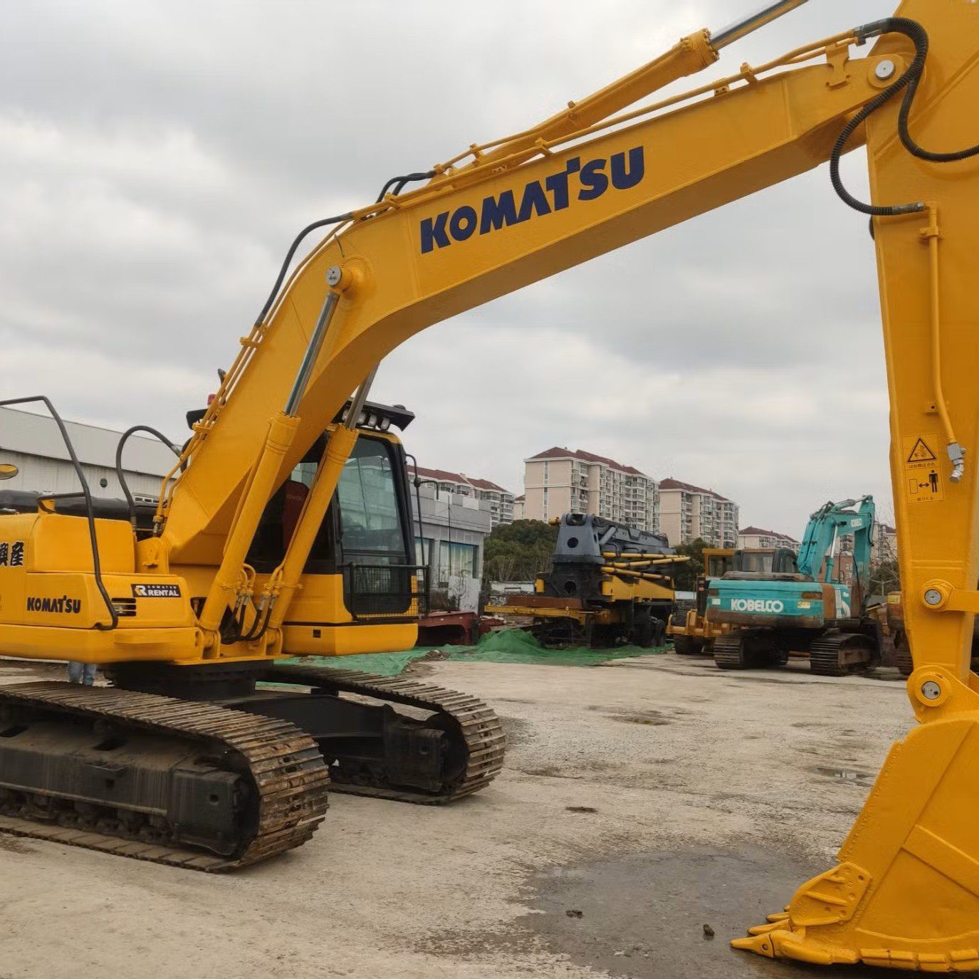 Excavators & Backhoe Loaders